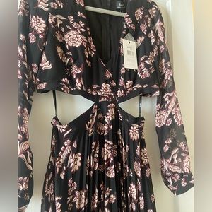 Beautiful Bardot cutout dress with tags.